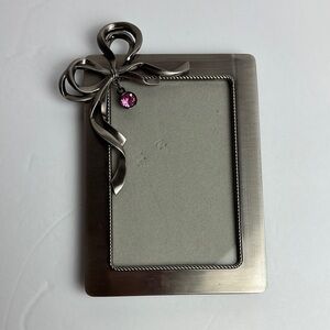 Silver Photo Frame with a decorative bow and a pink gem accent.  5X7